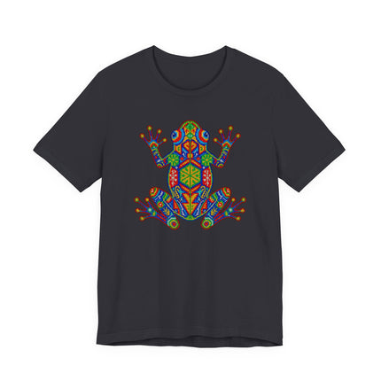 Vibrant mosaic Huichol frog design on a black unisex t-shirt featuring Mexican folk art.
