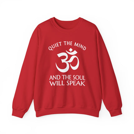 Red sweatshirt featuring the Om symbol and "Quiet the Mind, Soul Will Speak" spiritual message.