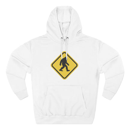 Sasquatch crossing warning sign graphic on a white pullover hoodie.