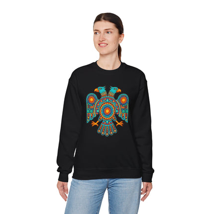 Vibrant two-headed eagle graphic in Huichol Mexican indigenous art style on black sweatshirt.