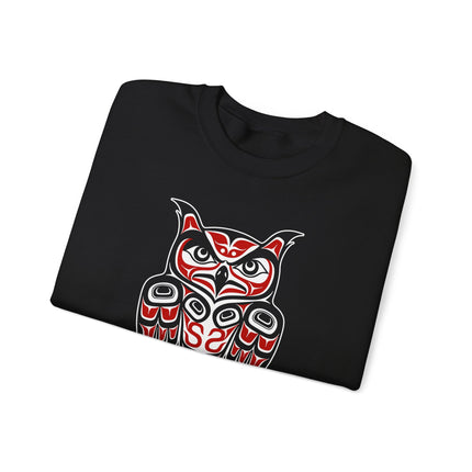 Red and black sweatshirt featuring Indigenous Pacific Northwest formline owl art design.