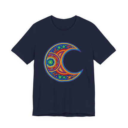 Colorful Huichol art crescent moon mandala on a navy blue graphic t-shirt.