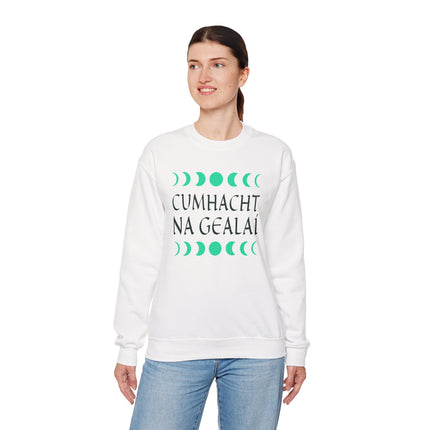 White sweatshirt featuring "Cumhacht Na Gealaí" and celestial moon phase symbols.