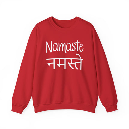 Red sweatshirt featuring "Namaste" and "नमस्ते" in Devanagari script, symbolizing Indian culture.