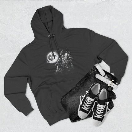 Celestial howling wolf and full moon graphic on a black pullover hoodie.