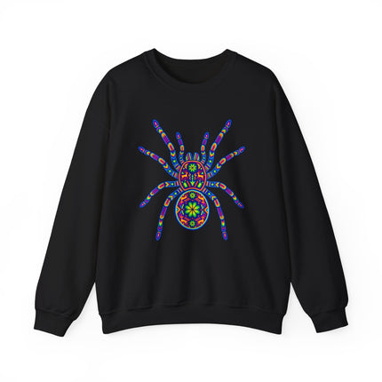 Colorful Huichol tarantula folk art graphic on a black sweatshirt.