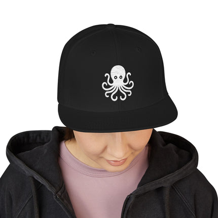 Black snapback cap featuring a white embroidered octopus design.