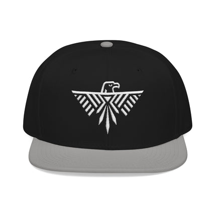 Black snapback hat with white geometric eagle and tribal embroidery design.