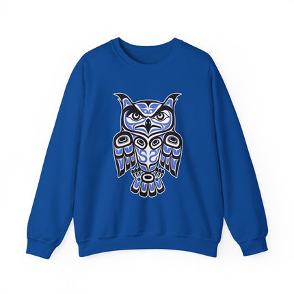 Indigenous Pacific Northwest owl formline art graphic on a blue sweatshirt.