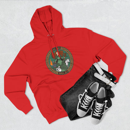 Brigid Celtic Goddess design on a red unisex pullover hoodie featuring Irish mythology art.