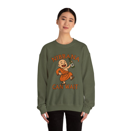Nibbana Can Wait funny monk graphic sweatshirt featuring a cartoon Buddhist figure drinking a can.