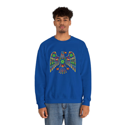 Vibrant Huichol-style eagle graphic on a blue unisex sweatshirt featuring Mexican folk art.