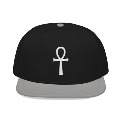 Black snapback hat featuring a white embroidered Ankh symbol of life.