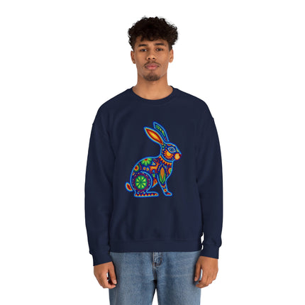 Vibrant Huichol art beaded rabbit design on a dark blue unisex sweatshirt. Mexican folk art style.