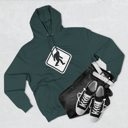 Bigfoot Sasquatch warning sign graphic on a unisex pullover hoodie.