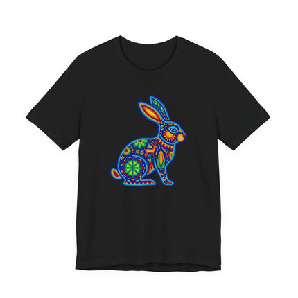Vibrant Mexican folk art rabbit graphic on a black t-shirt, featuring Huichol style design.