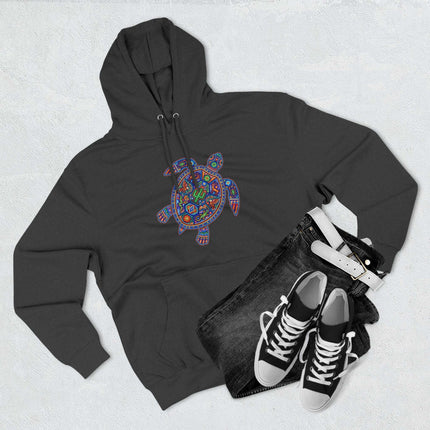 Vibrant Huichol Mexican folk art turtle graphic on a black pullover hoodie.