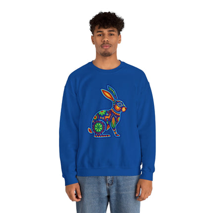 Blue sweatshirt featuring a vibrant Huichol Mexican folk art rabbit design.