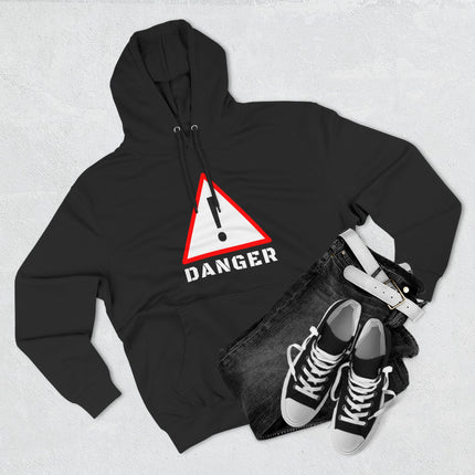 Black hoodie featuring a bold red and white danger warning sign graphic.