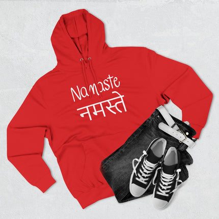 Red Namaste hoodie featuring the spiritual greeting in English and Hindi Devanagari script. Perfect yoga or cultural gift.