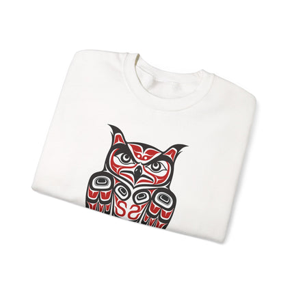 Pacific Northwest owl formline art on a red and black sweatshirt featuring Indigenous artwork.
