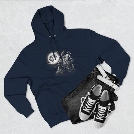 Howling wolf under a full moon graphic, celestial night sky wildlife art on a dark hoodie.