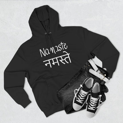 Black pullover hoodie featuring the Namaste greeting in English and Hindi Devanagari script.