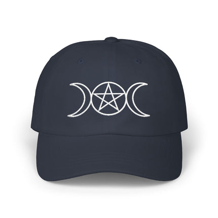 Embroidered triple moon and pentagram symbol on a dark baseball cap.