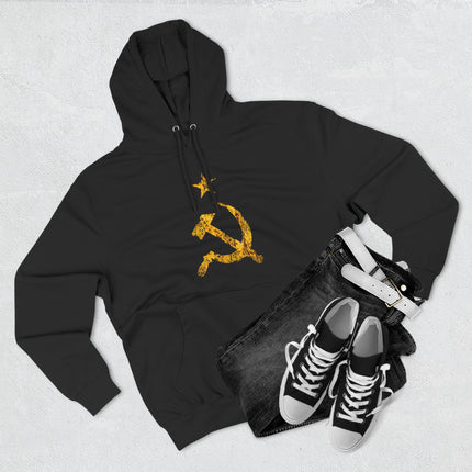 Black pullover hoodie with distressed yellow communist hammer and sickle emblem.