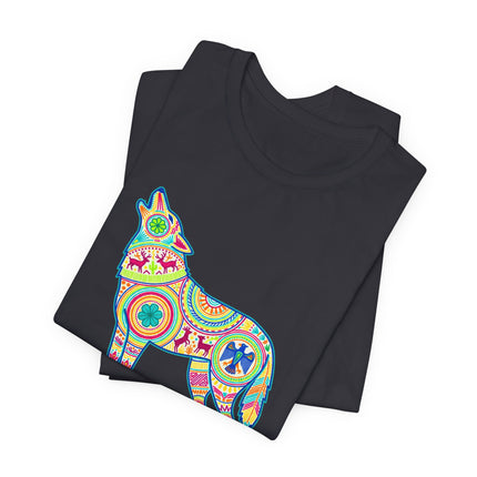Vibrant Huichol folk art wolf graphic tee featuring geometric Mexican tribal patterns.