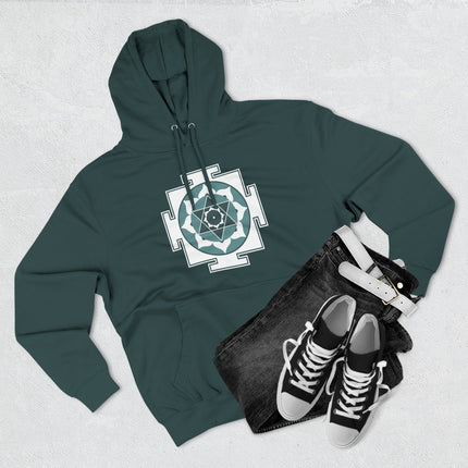 Sacred geometry Kamala Yantra design on a dark green spiritual hoodie.
