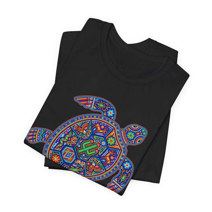 Vibrant Huichol turtle design graphic tee, showcasing Mexican indigenous cultural art.