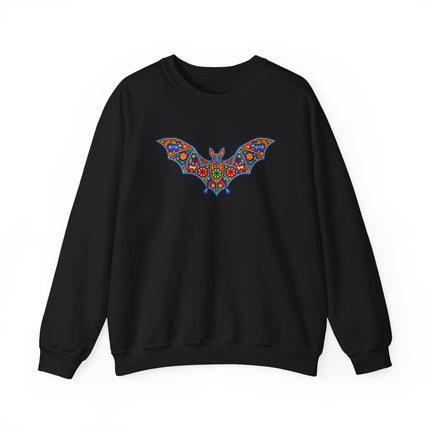 Colorful Huichol bat artwork printed on a vibrant Mexican folk art pullover sweatshirt.