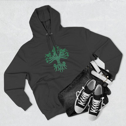 Green Celtic Tree of Life graphic on black hoodie, symbolizing the World Tree and eternal life.