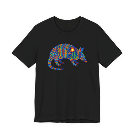 Colorful Huichol-style armadillo graphic tee featuring vibrant Mexican folk art patterns.