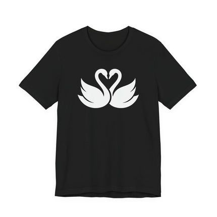 Swans forming a heart graphic on a black t-shirt, symbolizing love and romance.