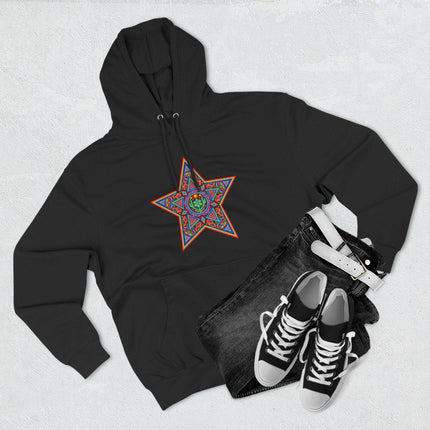 Vibrant Huichol star art on a black hoodie. Geometric indigenous pattern print.