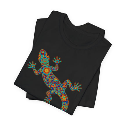 Vibrant Huichol lizard graphic tee featuring colorful Mexican geometric folk art design.