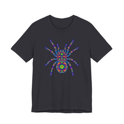 Black t-shirt with a vibrant Huichol-style tarantula graphic featuring rainbow mandalas.