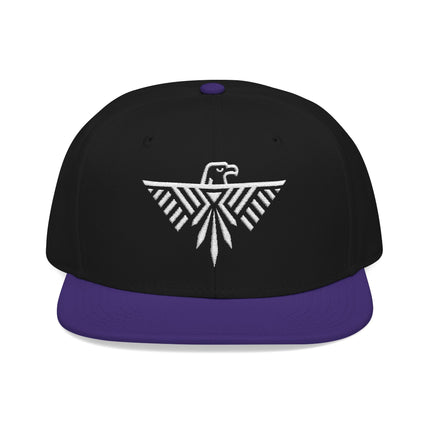 Geometric eagle embroidery on a black snapback hat with purple brim.