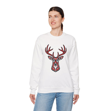 Red and black tribal deer head graphic on a white sweatshirt, featuring Pacific Northwest formline art.