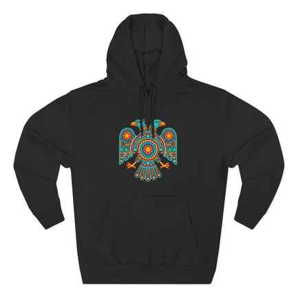 Vibrant two-headed eagle graphic on black hoodie, featuring Mexican Huichol folk art style.