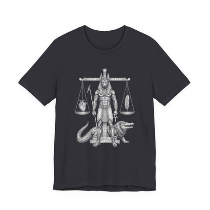 Anubis Egyptian mythology design with scales of justice on a black t-shirt.