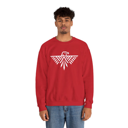 Red sweatshirt with white geometric eagle graphic, inspired by Native American art.