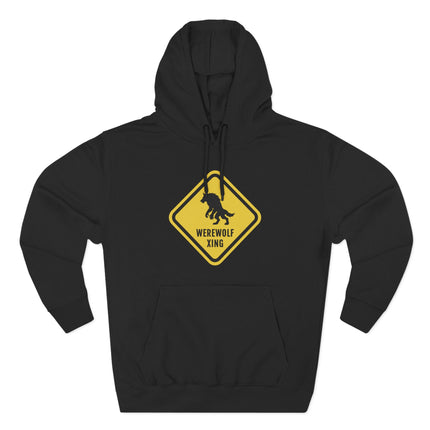 Black hoodie featuring a yellow warning sign graphic with a werewolf silhouette and "WEREWOLF XING" text.