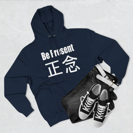 Navy hoodie with 'Be Present 正念' graphic. Mindfulness and Zen meditation apparel.