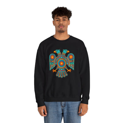 Vibrant two-headed eagle graphic on black sweatshirt, inspired by Mexican Huichol indigenous art.