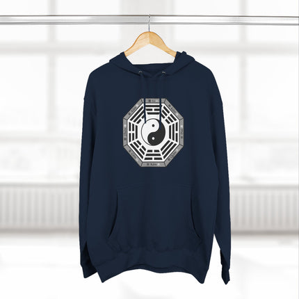 Yin Yang and Bagua trigram symbol graphic on a navy blue unisex hoodie.
