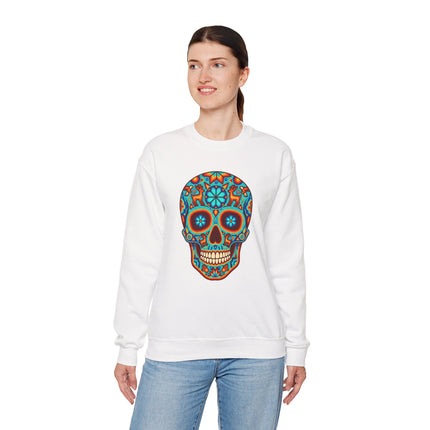 Mexican Huichol sugar skull graphic on a white unisex sweatshirt, celebrating Día de Muertos.
