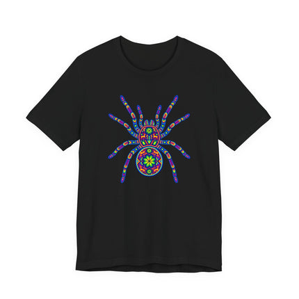 Rainbow tarantula mandala graphic on black tee, featuring vibrant Huichol Mexican folk art style.